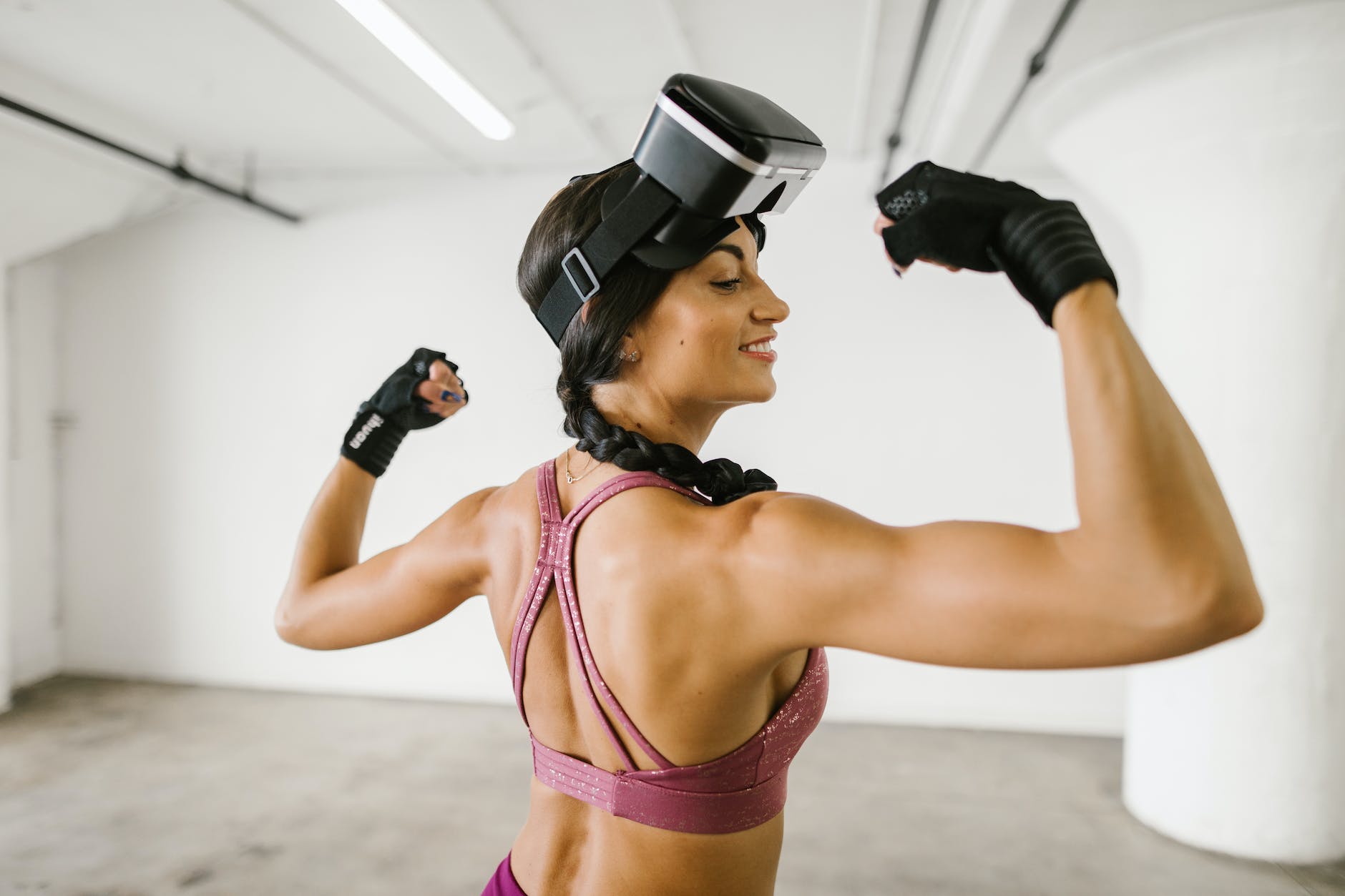 fit woman wearing virtual reality glasses