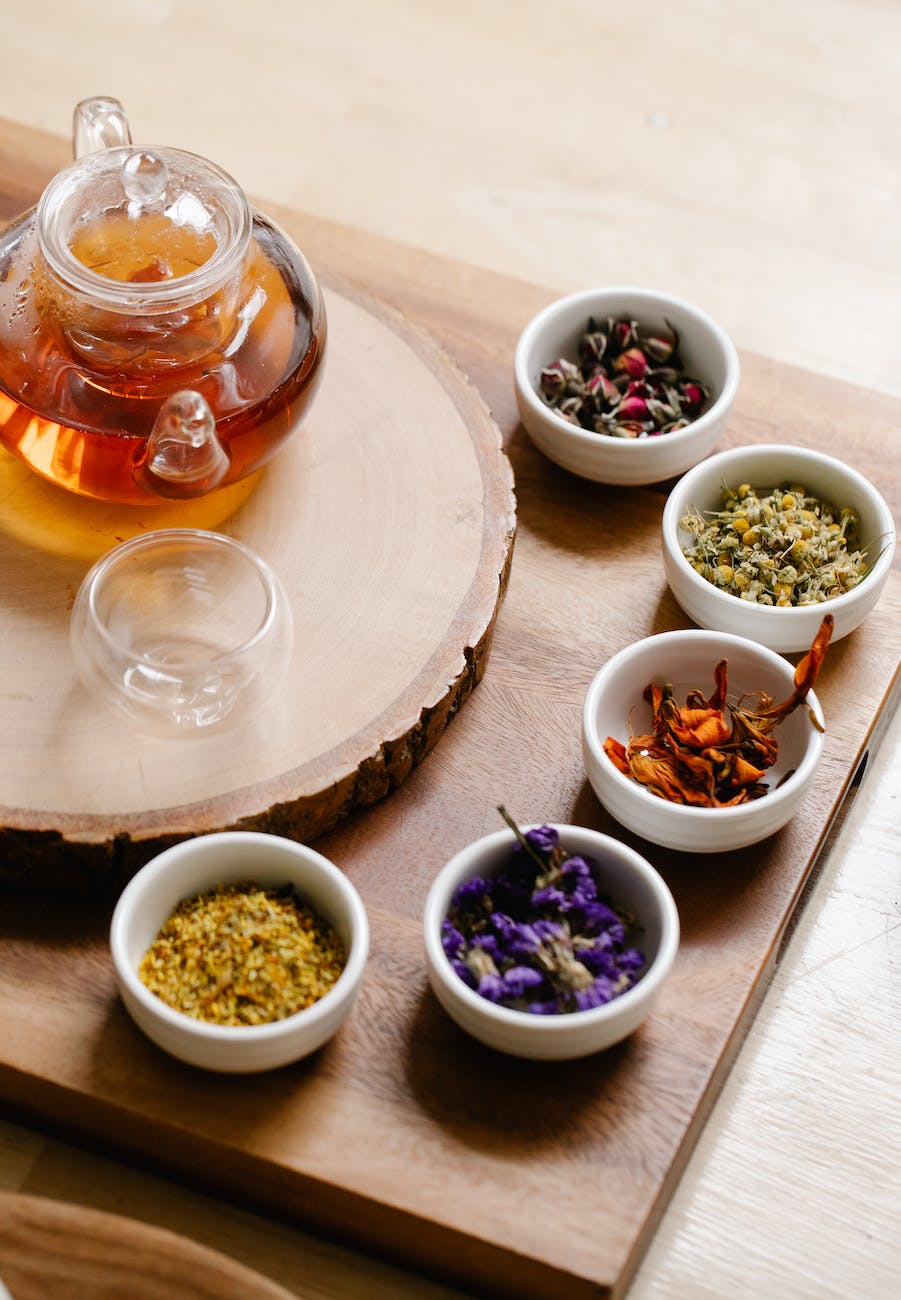 assorted herbs on bowls