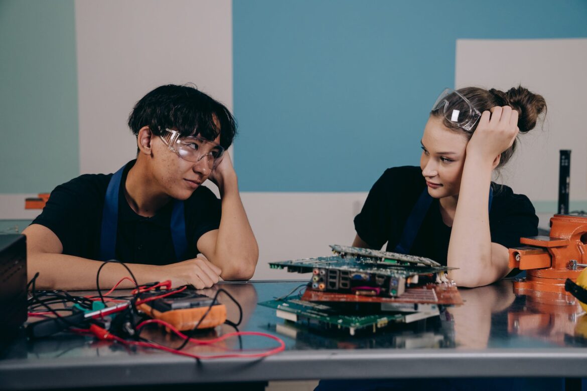 people working with electronics